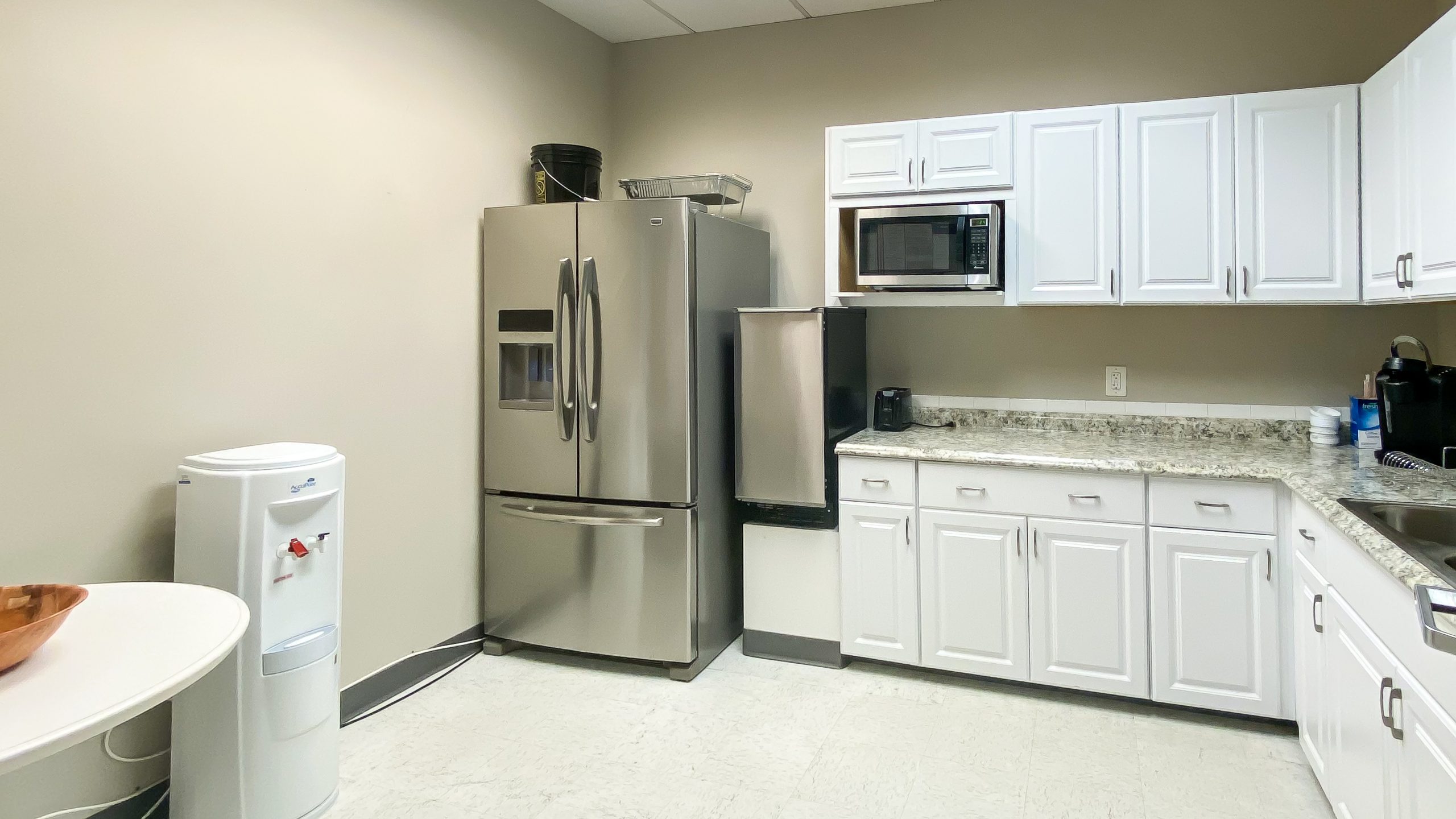 The interior of an office kitchen for lease.